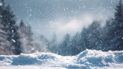 Snowy winter landscape background with falling snowflakes and blurred evergreen trees, Christmas winter scene with copy space