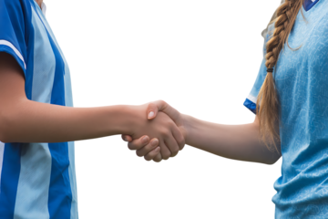 Two female soccer players shaking hands