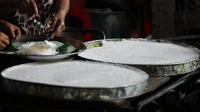 Thai southern Desserts made by Cassava root powder and coconut milk, steamed.