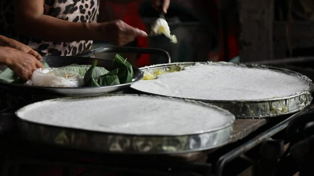 Thai southern Desserts made by Cassava root powder and coconut milk, steamed.
