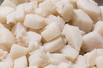 Render pork fat to extract lard and crispy pork cracklings