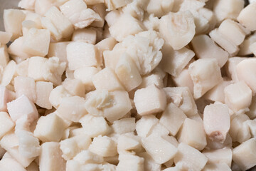 Render pork fat to extract lard and crispy pork cracklings