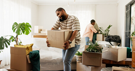 Box, phone call and real estate with black couple moving in to new home for relocation or update. Carry, conversation and property with people in apartment for mobile discussion, packing or planning