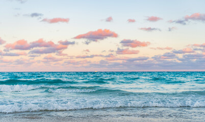 Sea sunset on ocean. Sunset seascape at summer vacation. Sunrise with sea beach. Dramatic sunrise horizon at sea. Romantic summer vacation on sunset seascape. Serene horizon