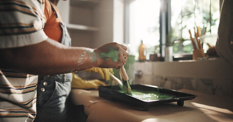 DIY, hand and painting with person in kitchen of apartment for home improvement or renovation....