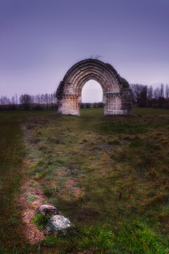 Ruins of the medieval Romanesque church of the Arch of San Miguel de Mazarreros, in Olmillos de Sasamon, Burgos, Spain