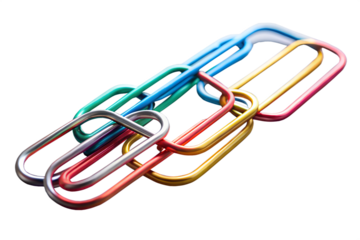 A group of colorful metal paperclips are isolated on transparent background, ready to hold documents together