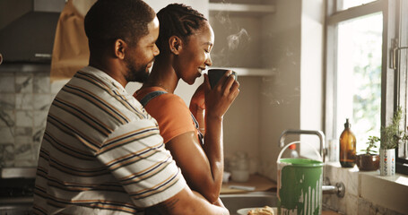 Home renovation, paint and couple with coffee, hug or romance on break in kitchen, love and morning. Happy, black man and woman with caffeine, bonding or remodeling of new house, color or maintenance
