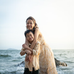 mother and daughter on the beach