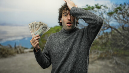 Man surprised holding british pounds in park, showcasing a unique intersection of culture and...