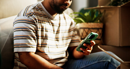 Phone, hands and moving with man in new home for property investment, relocation options or email....