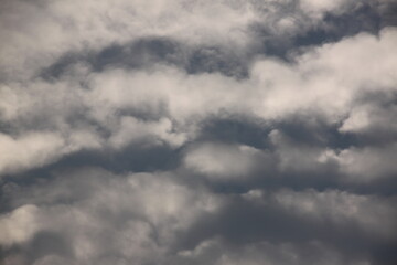 Dark gray clouds fill the sky, creating a moody and overcast atmosphere