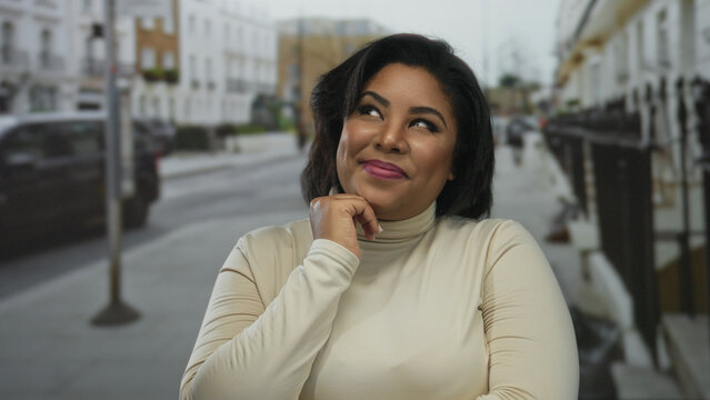 Woman smiling in an urban outdoor setting with a background of city street and cars, showcasing a confident plus-size hispanic appearance.