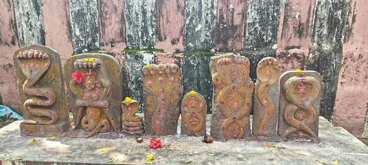 A spiritually resonant view of Thirukazhukundram, Tamil Nadu, India, capturing both the hilltop Vedagiriswarar Temple and the ancient foothill temple complex. The hill temple, dedicated to Lord Shiva,