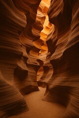 A stunning view of the iconic Antelope Canyon with sunlight filtering through the narrow, winding sandstone walls