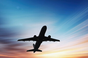 Airplane in the sky, over the cloudy sky , vacation holidays travel tourism

