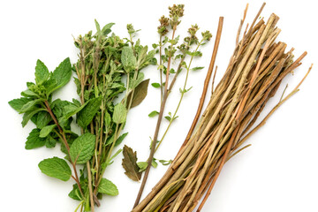 Dried ayurvedic chirata stems and herbal leaves for medicinal use on white background