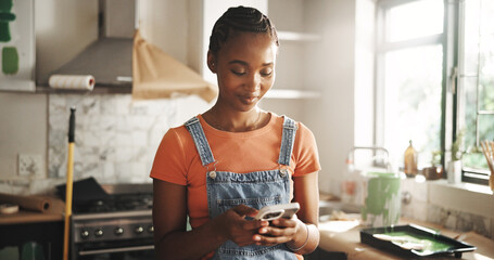 Painting, phone and woman in home for renovation, interior design or chat for diy upgrade. Mobile,...