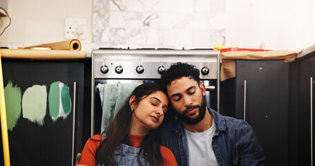 Paint, renovation or couple tired with rest in kitchen for home upgrade, DIY makeover or nap....