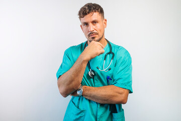 Serious Doctor with Hand on Chin Thinking
