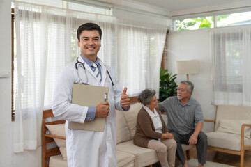 Obraz premium Doctor man health checkup with Asian couple elderly patient at home visit. Retirement health care and life insurance concept