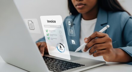 African American Woman Reviews Digital Invoice on Laptop with Stylus