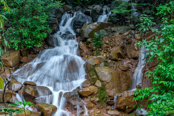 A waterfall during the monsoons near Pune India. Monsoon is the annual rainy season in India from June to September.