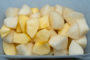 Diced apple pieces are small, cube-shaped cuts of apple. They are fresh, sweet, and slightly tangy. Perfect for healthy snacks, salads, or as an addition to various dishes.