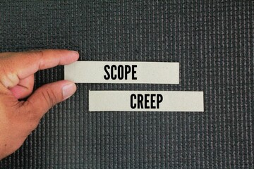 paper with the word Scope Creep. continuous or uncontrolled growth in a project's scope, at any...