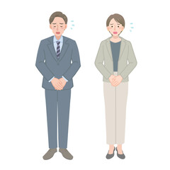 謝罪するビジネスマンの男女