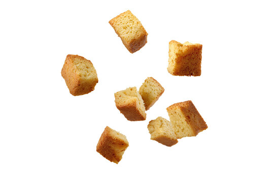 a group of pieces of bread that are falling