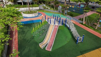 Aerial image of children’s outdoor activity area with climbing and fitness features