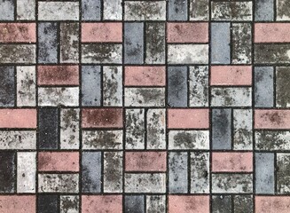 multicolored paving slabs after rain background texture