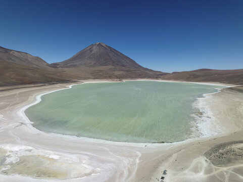 Aerial view of the serene Laguna Verde mirroring the sky under the shadow of the Licancabur volcano, San Pablo de L&Atilde;&shy;pez, Potosi Department, Bolivia.