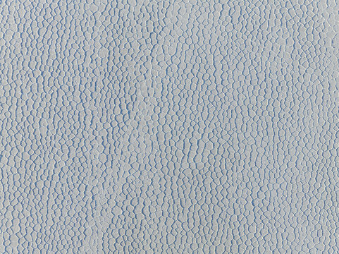 Aerial view of the abstract landscape of white and blue, where nature's artistry is etched across the terrain, San Pablo de L&Atilde;&shy;pez, Potosi Department, Bolivia.