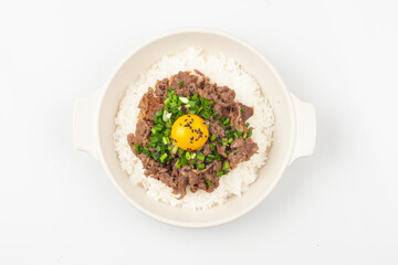 Bulgogi rice bowl is a dish made by marinating and grilling lean meat over a fire and then placing...