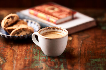 Cup of coffee on wooden background. Soft focus. Copy space	