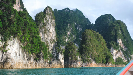 A long tail boat while traveling to the Cheow Lan reservoir and limestone mountains