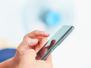 Close up hand people using smartphone browsing internet, business, text or online shopping. Senior woman use mobile phone AI chat bot and communication family. Female touch screen phone social media 