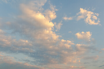Pastel clouds at sunset in peaceful sky