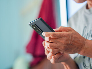 Close up hand people using smartphone browsing internet, business, text or online shopping. Senior woman use mobile phone AI chat bot and communication family. Female touch screen phone social media 