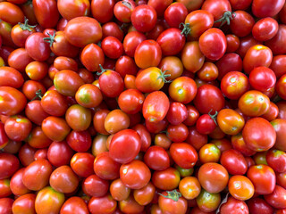 Top view of pile of red tomatoes