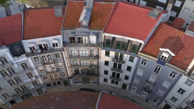 Curvy Street in Lisbon with Azulejo Fascades. Aerial Shot of Traditional Portuguese Houses decorated with Ceramic Tiles