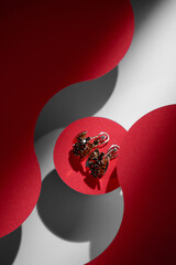 Close-up of jewelry on colored paper