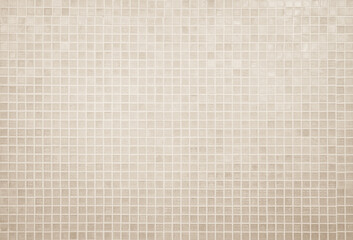 Cream light ceramic wall and floor tiles mosaic background in bathroom and kitchen. Design pattern geometric with grid wallpaper texture decoration pool. Simple seamless abstract surface clean.