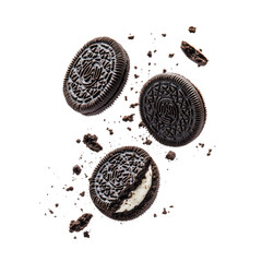 flying Oreo cookies with crumbs isolated on transparent white background, clipping path