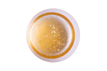 a glass of beer with a lot of bubbles