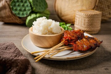 Thai-Styled BBQ Pork with Sticky Rice ,Thai call Moo ping,Sticky rice with grilled pork,
