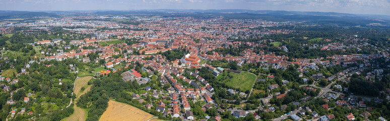 Aerial panorama view around the old town in the city Bamberg in Bavaria on an sunny spring day in Germany	
