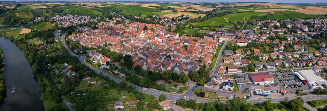 Aerial panorama view around the old town in the city Dettelbach on an sunny spring day in Germany	
